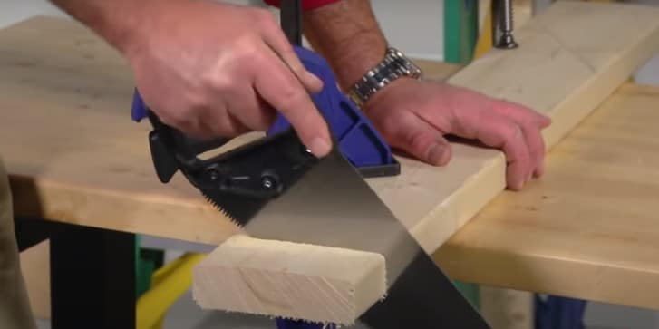 How to cut wood with a saw